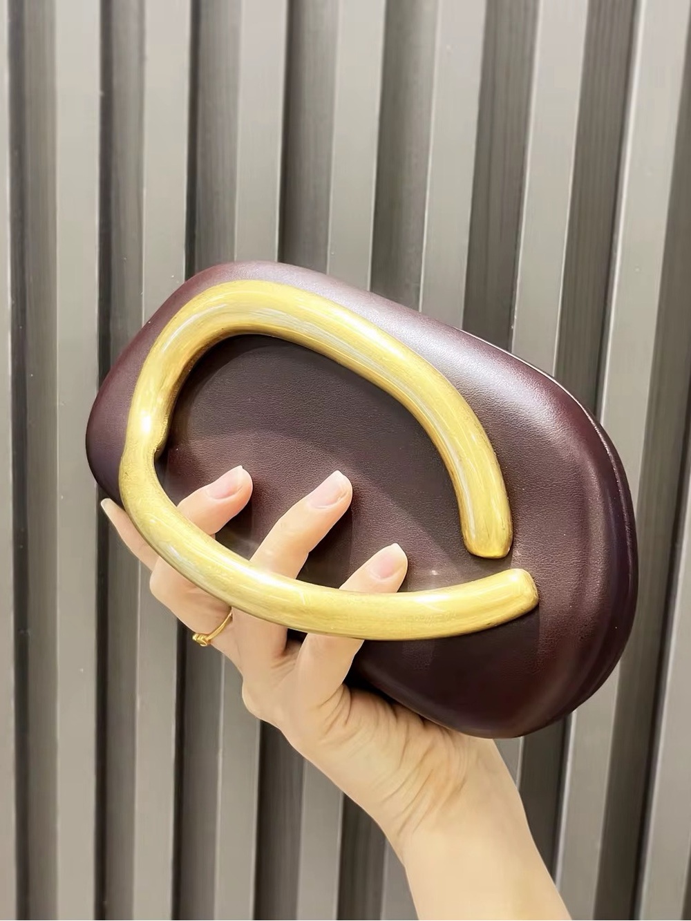 Elegant Brown Leather Clutch with Gold Handle